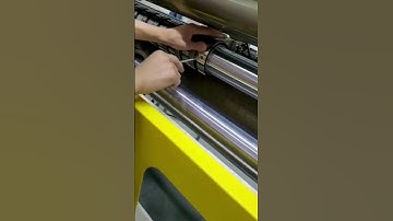 KNIVES SETTING ON SLITTER