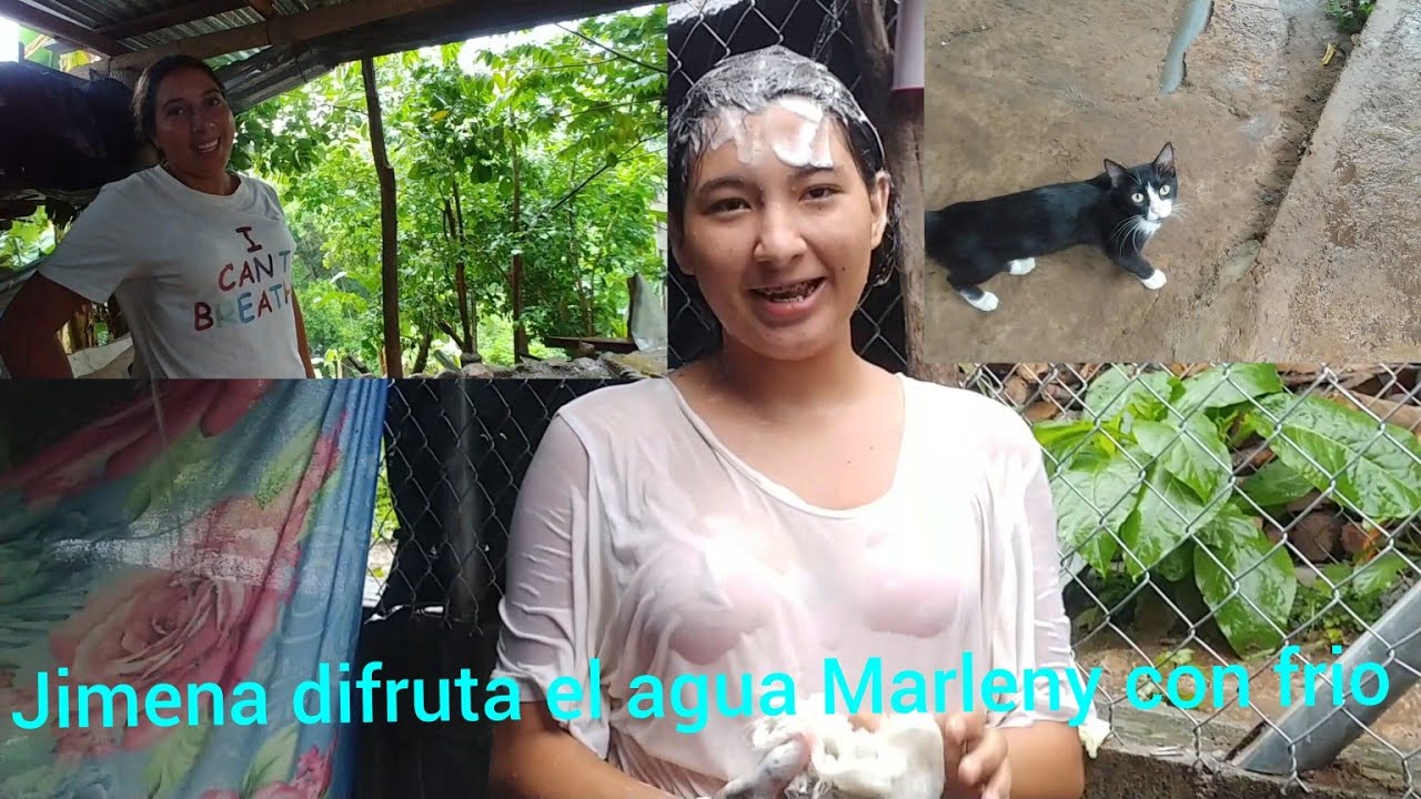 Jimena difruta La Lluvia anda con todo bañandose