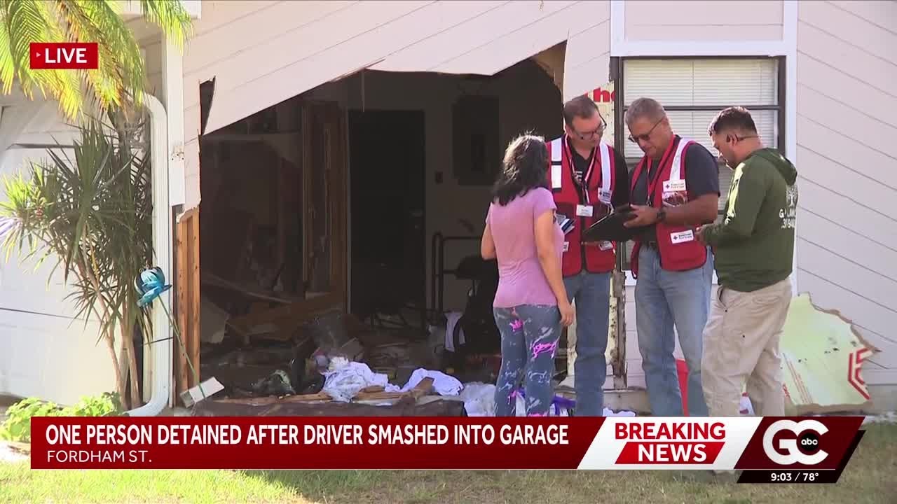 Driver arrested after car crashes into the side of a garage on Fordham ...