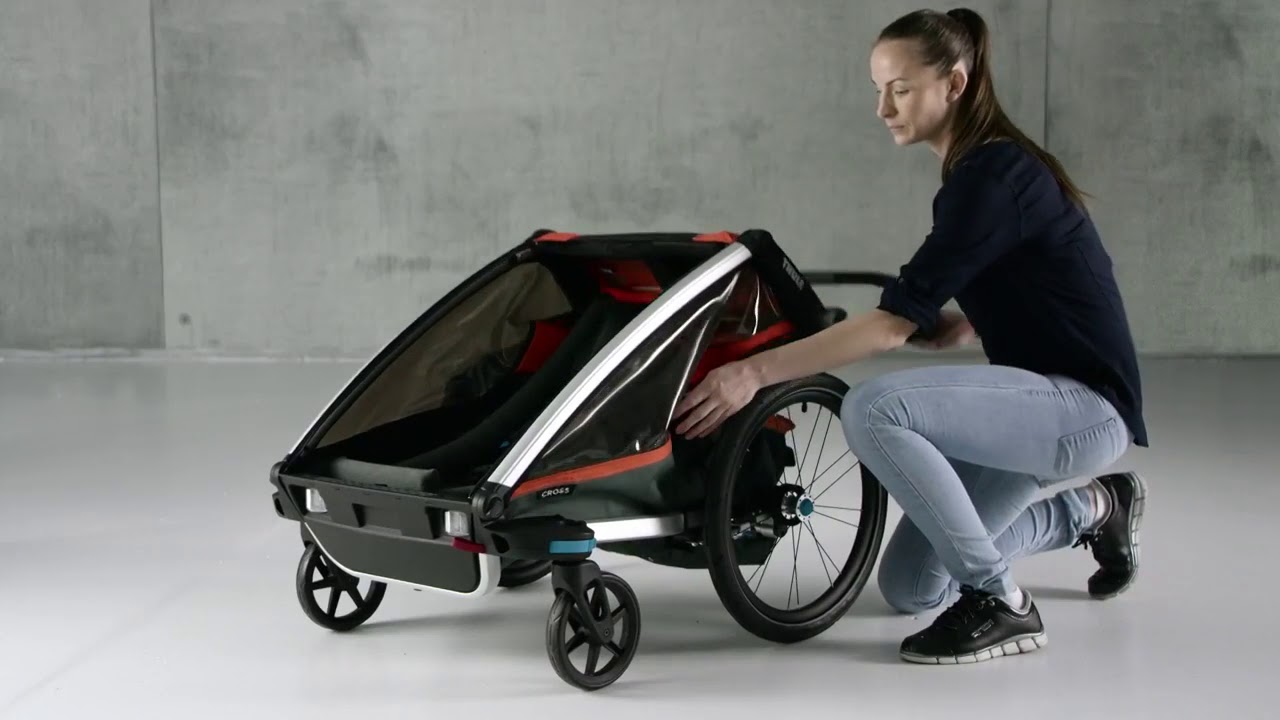 Chariot équipé d'une coque bébé