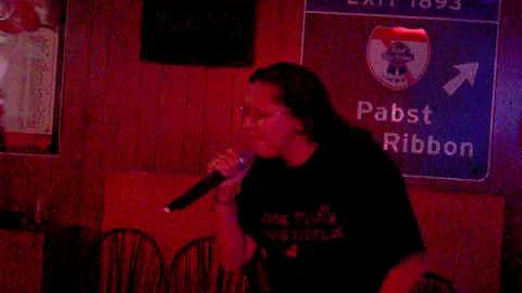Dixie Perez sings karaoke