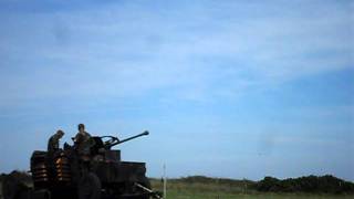 Members of the 4th air defence battery, 1st regiment firing bofors
e/l70 40 at annual shoot, gormanstown, co. meath