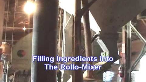 The Continental Rollo Mixer Blending and Coating Calf feed with Molasses