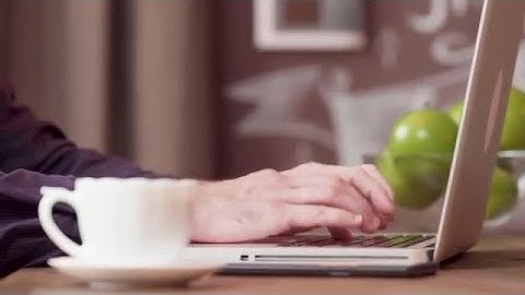 Man Typing On Laptop Stock Video