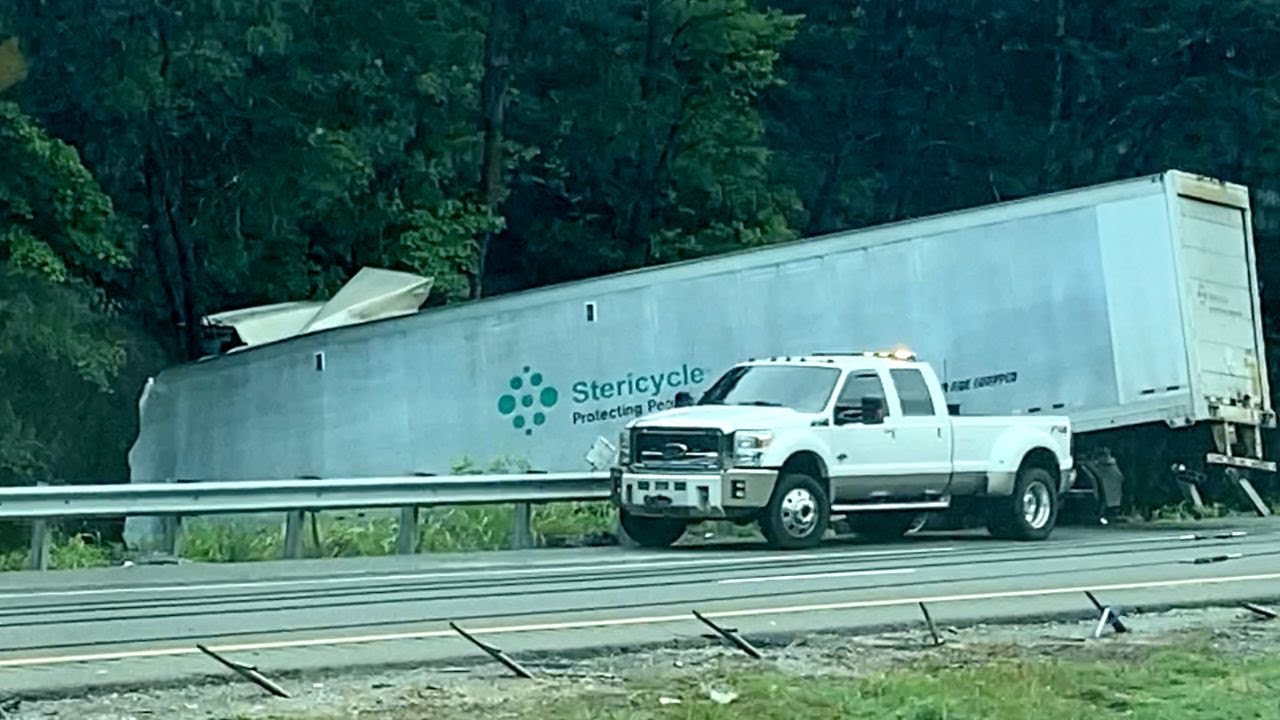 Tractor Trailer nose dive into ditch - YouTube