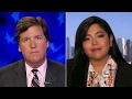 Tucker to author: Why's Trump's wall a symbol of hate?