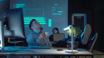 Man Drinking Coffee In Office Stock Video