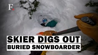Watch: Snowboarder Buried Head-First Saved In Heroic Rescue
