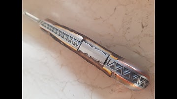 Doing the filework for back and inside for a folding knife