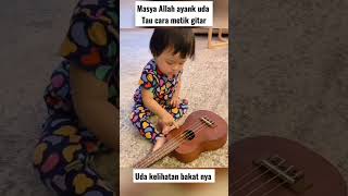 Ameena  learn to play guitar