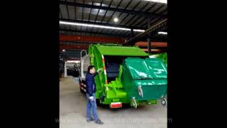 Compress garbage truck working