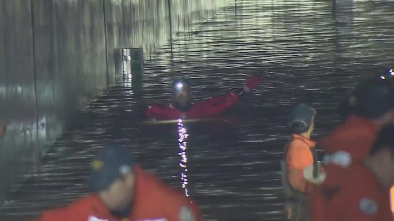 Search and recovery efforts continue in flooded tunnel in South Korea