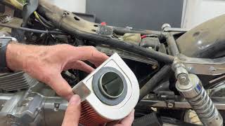Getting started on the 2009 Honda Rebel 250, Carb rebuild, Gas tank, seat and side cover removal