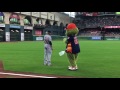 Astros mascot Orbit swats at Martinez, security guard