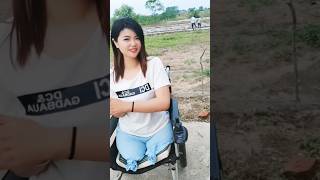 A pretty girl with an amputated legs walks with wheel chair#shorts #amputee #amazing #wheel_chair