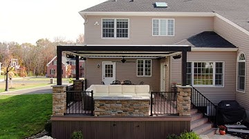 Custom deck with louvered roof, fire pit
