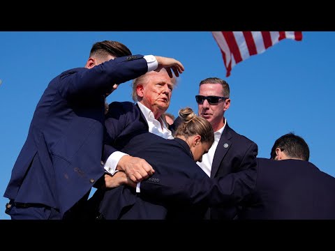 Trump rushed off