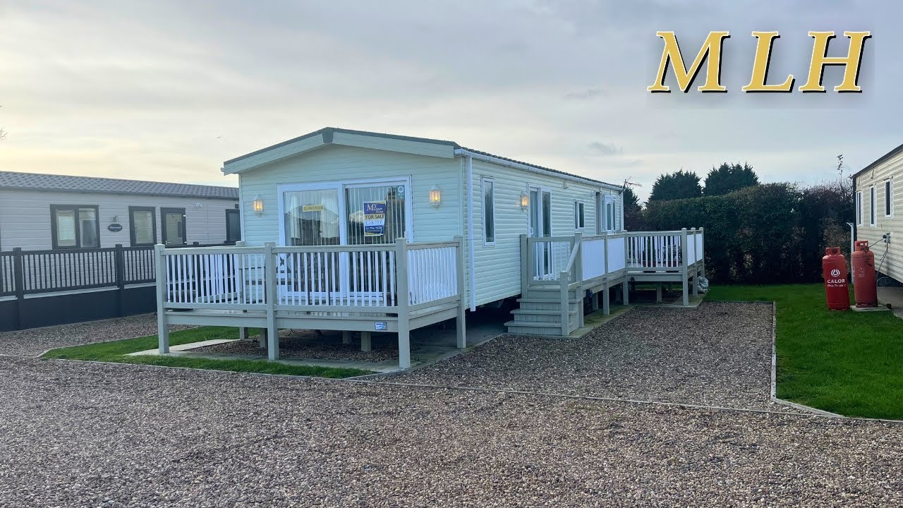 Прекрасный недорогой стационарный караван размером 40x14 футов с 3 спальнями, расположенный на те...