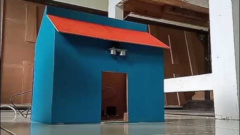PINTU GESER OTOMATIS MENGGUNAKAN SENSOR ULTRASONIC