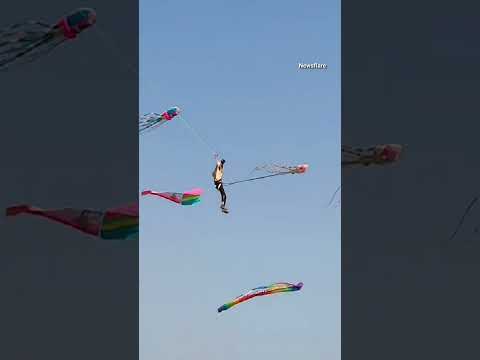 Chinese man dragged into sky by giant kite #shorts