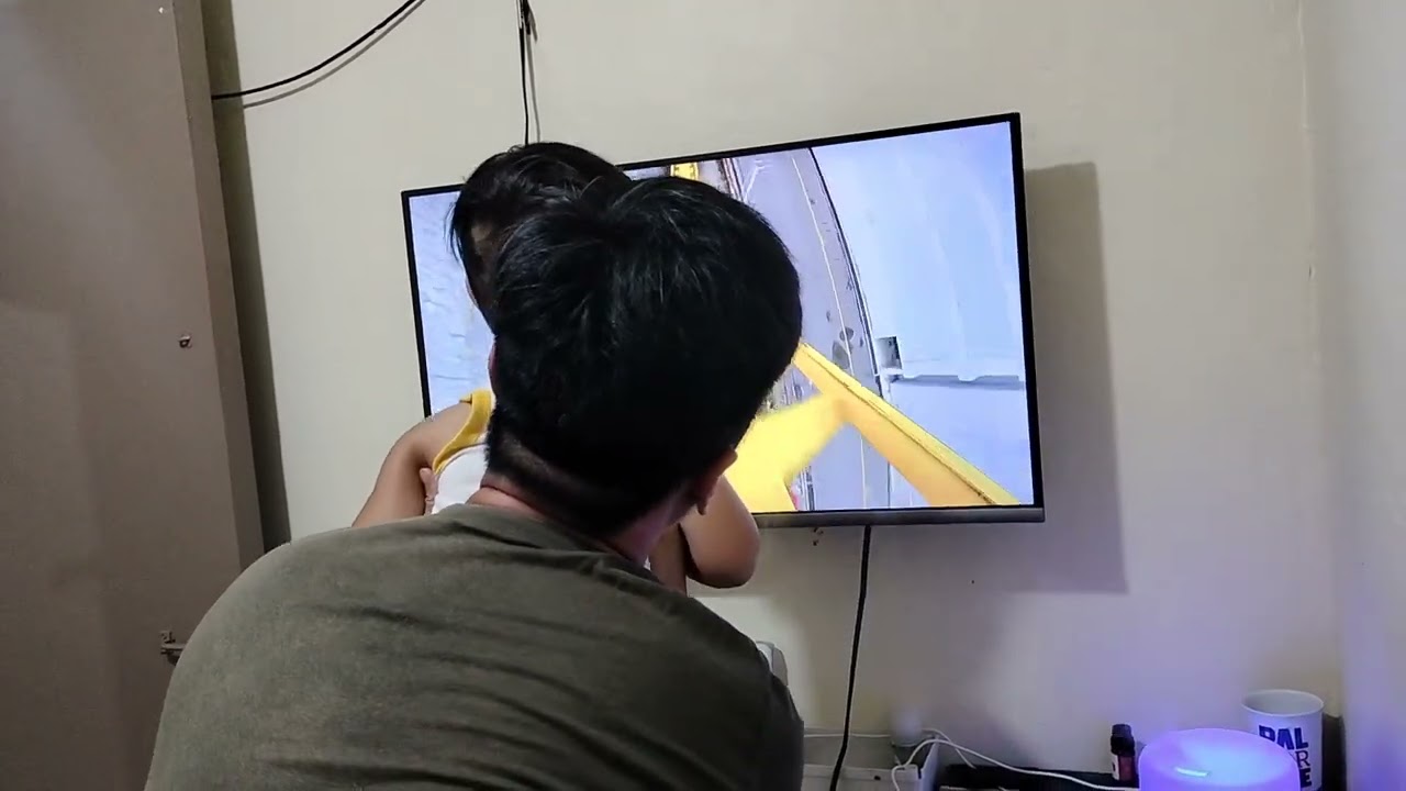 dad and son pretend roller coaster