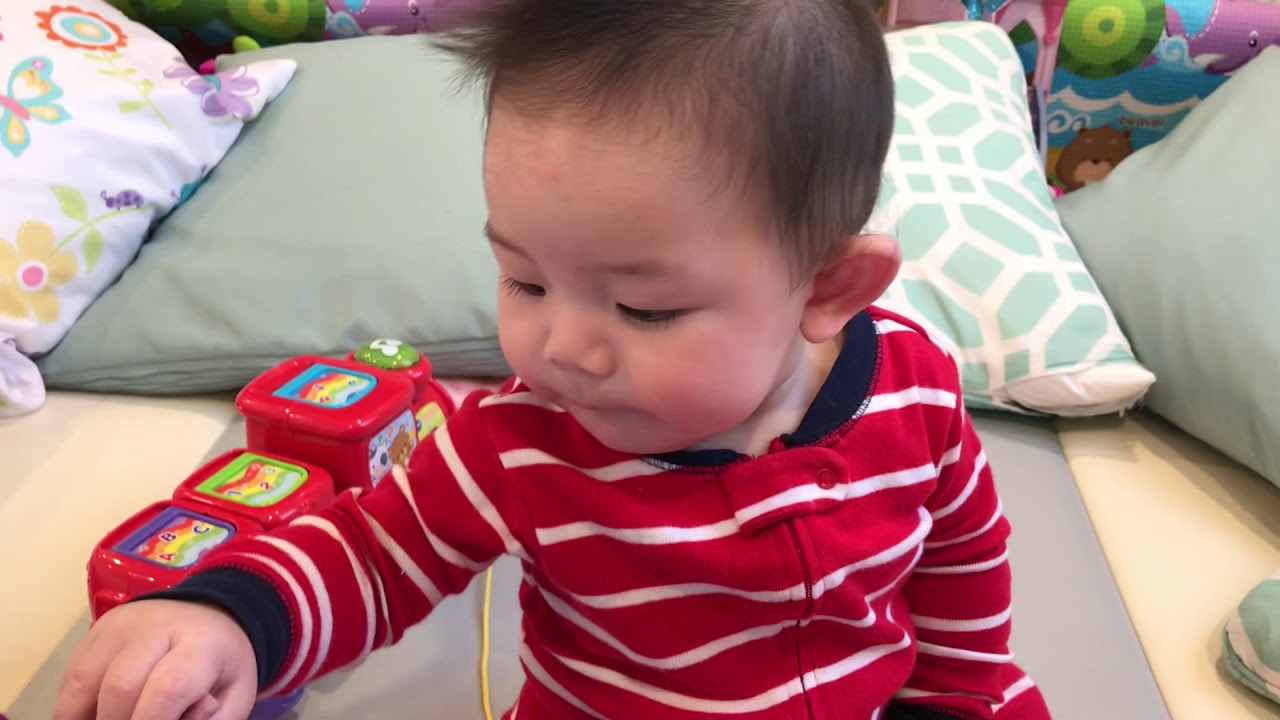 8 months old eating teething crackers. (122019) YouTube