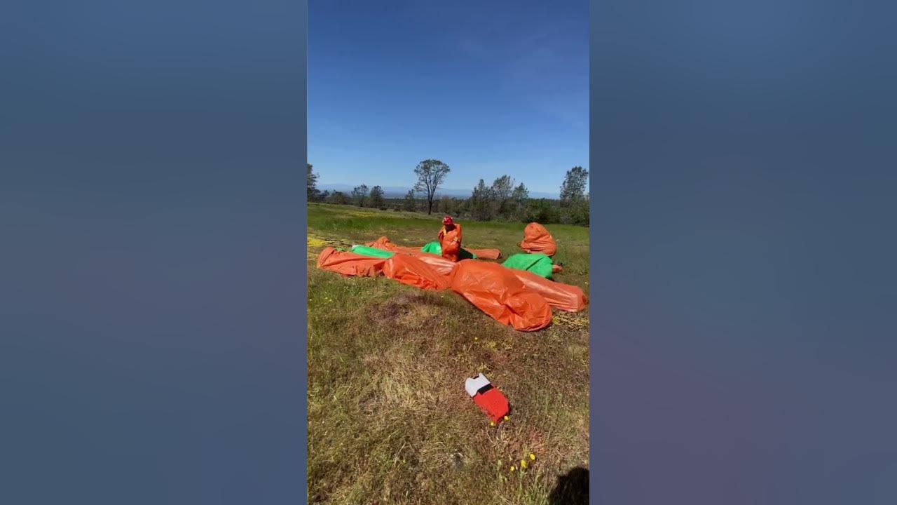 Wildland firefighters practicing fire shelter deployment youtube
