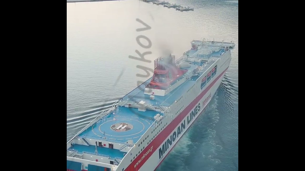 Vertical video. Igoumenitsa, Greece. Large ferry Minoan LINES Kydon Palace moored for unloading a...