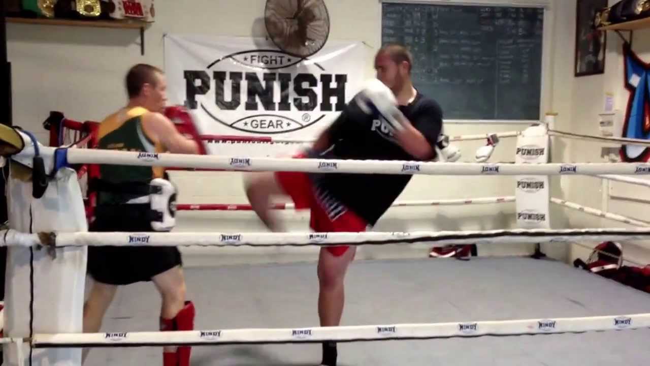 Alex hitting pads with Richard Walsh from Urban Fight Gym... Alex has already lost 51kg so far...