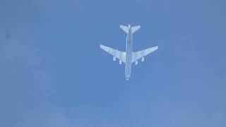 A nice cruising Antonov AN-124 Ruslan flying over in my area at 31,000 ft in Partly Cloudy skies