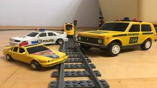 Awesome! Can the police cars stop the unmanaged passanger Lego train
