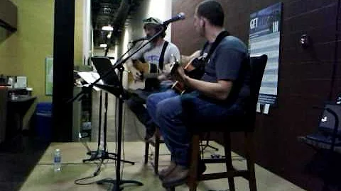 TJ Nelson playing guitar with Lee Jensen