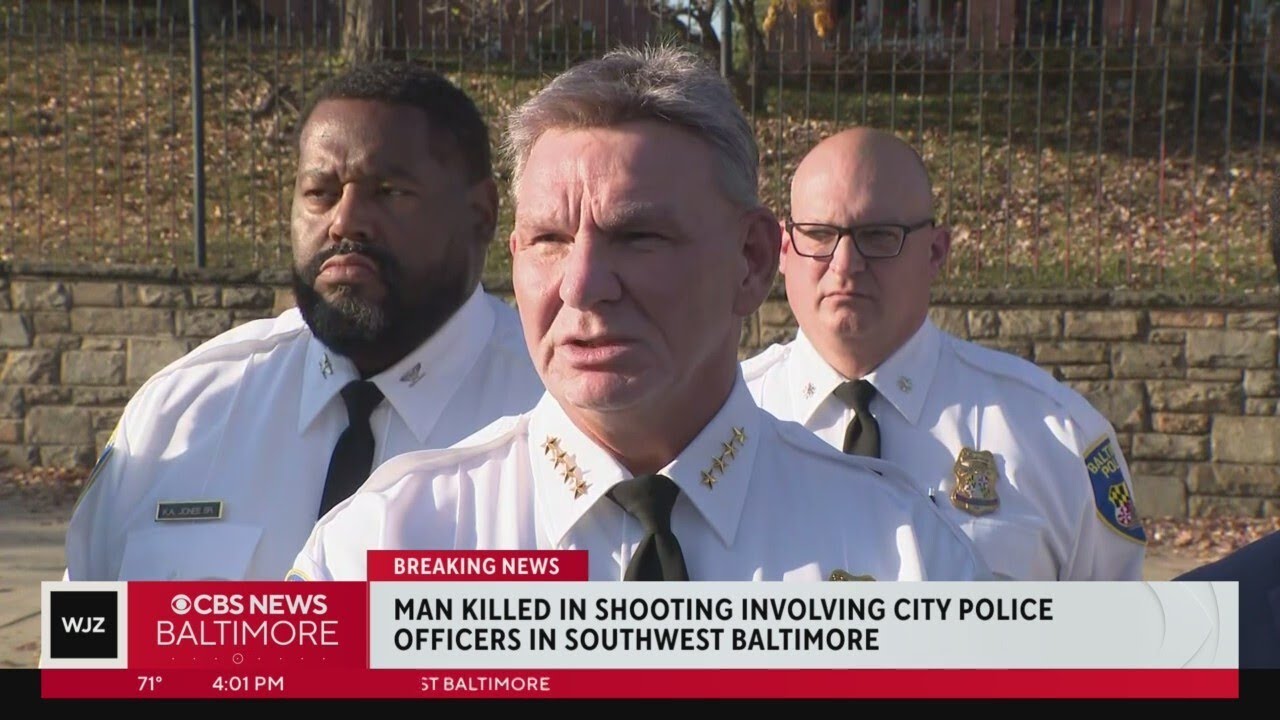 Man shot and killed after police say he pointed gun at officers in ...