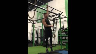 Single arm hanging shoulder shrug