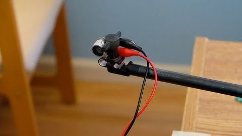 Lock-in amplifier demodulating ultrasonic sound