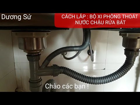 Video: Làm thế nào để bạn cài đặt một van đóng bồn rửa nén?