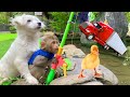 Monkey baby bobo goes fishing ducklings with puppy