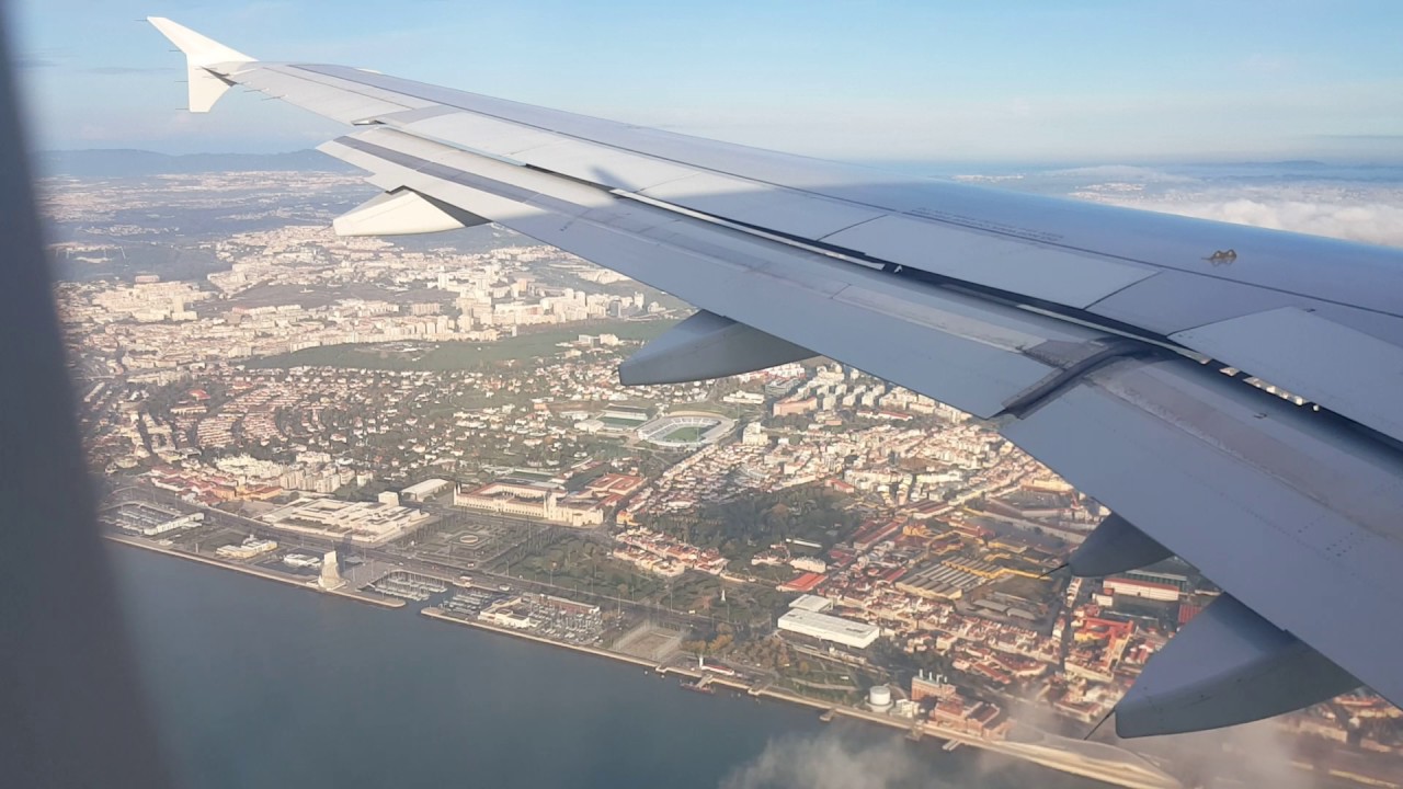 TAP Portugal A319 wing view landing in Lisbon - YouTube