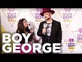 "Boy George" talks backstage with Martha Quinn at the iHeart 80's Birthday Bash