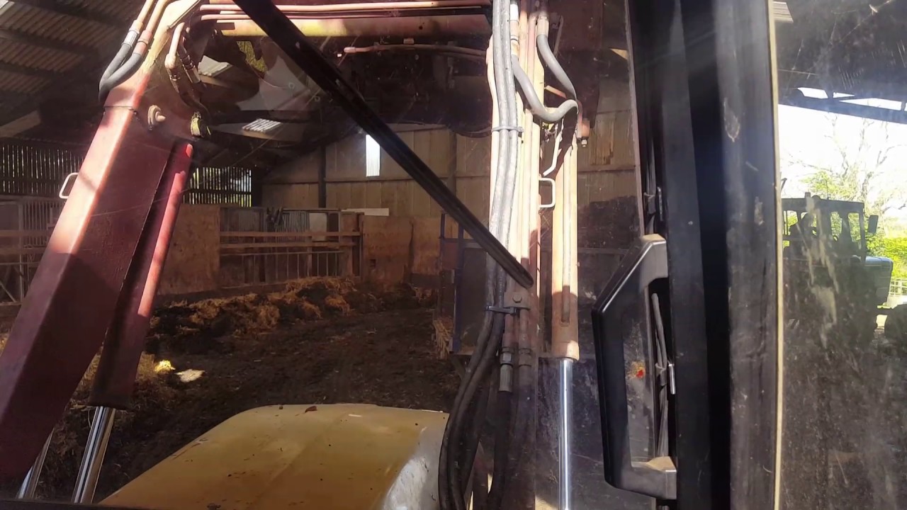 Mucking out the barn with Leyland 802 turbo tractor and loading david