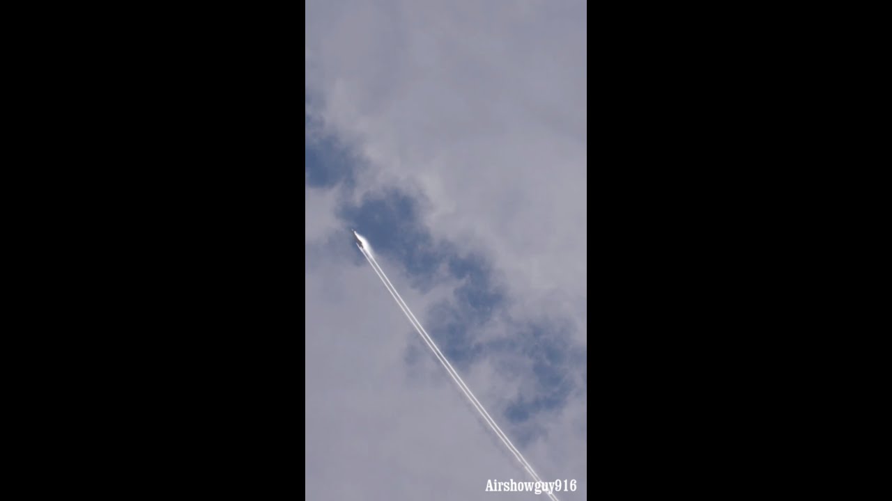USAF Stealth Fighter separates the clouds.  