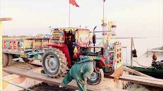 Loading and unloading of Tractor TATA dumper from the boat in indus river with operated skills by King motors 212 views 1 month ago 4 minutes, 25 seconds