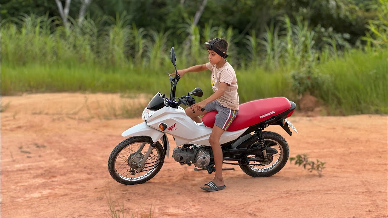 ENSINEI O MINI INSCRITO A ANDAR COM A POP 110.