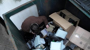 The Secret World of Gamestop Dumpster Diving