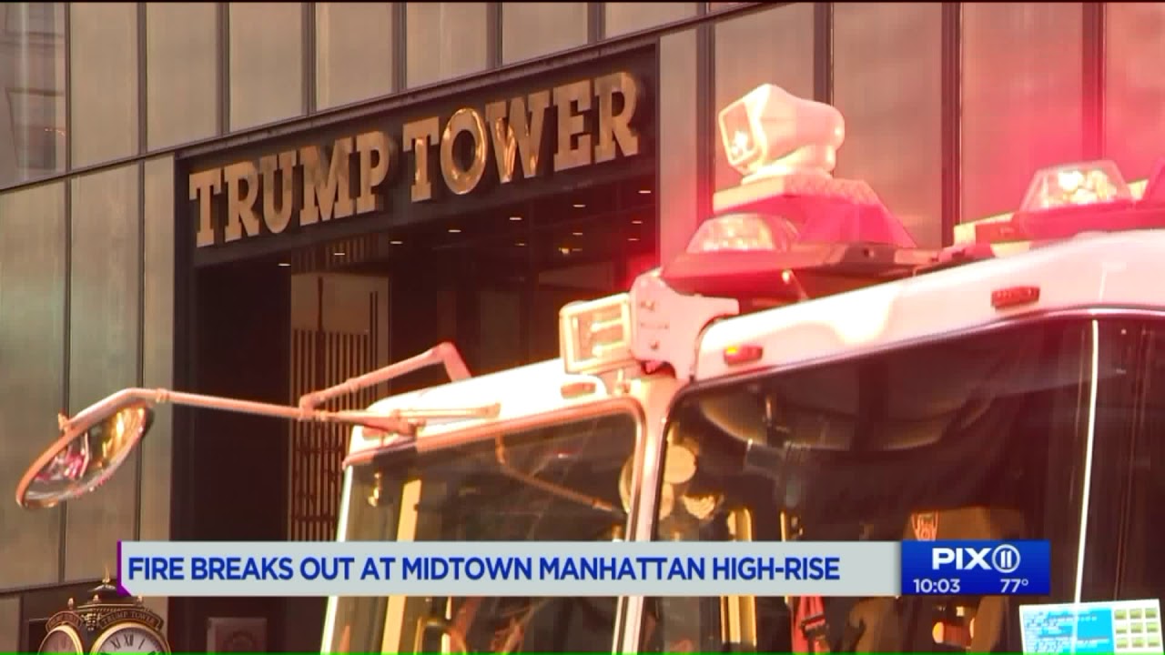 Firefighters battling fire at high-rise building in midtown - YouTube