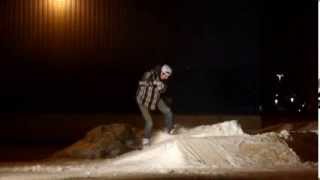 Snowskate backside double heelflips on a hip