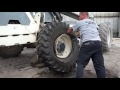 Changing a tire 14.00-24