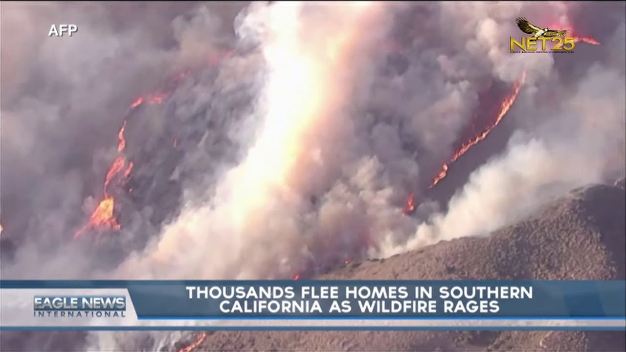 Thousands flee homes in Southern California as wildfire rages - YouTube