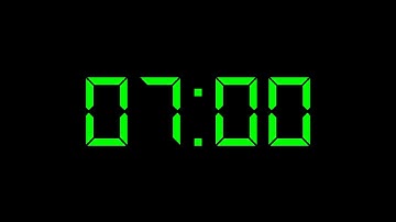 7 minute timer with green digital number and Music. Black background