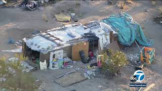 A joshua tree couple was arrested after san bernardino county
sheriff's deputies discovered their three children had been living in
large box for years, au...